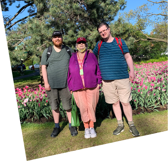 Group photo of 3 people outside