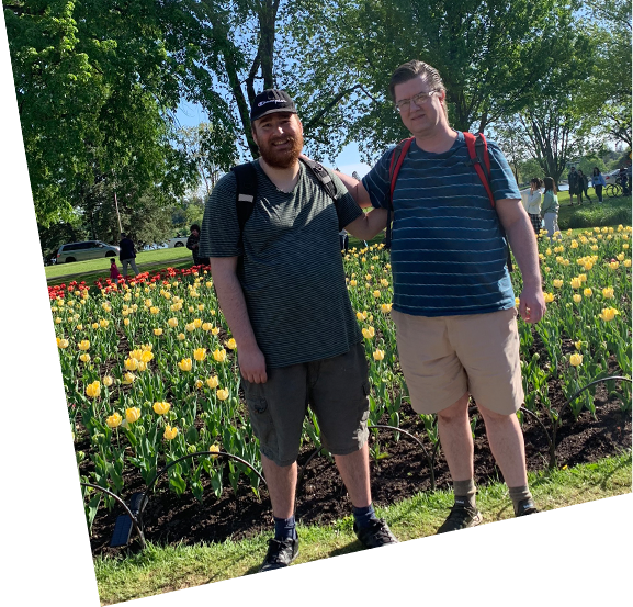 Christian and Mike in front of tulips